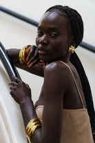 Kitte Vanity Earrings Gold Worn By Model