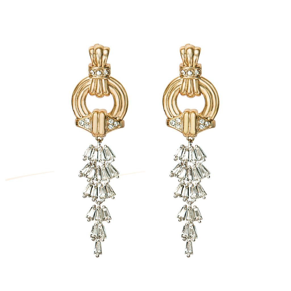 Gold earrings with diamond-like stones on a white background