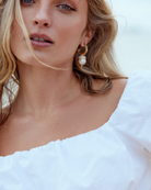 Kitte Serpents Earrings Gold worn by model