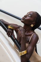 Kitte Fast Lane Bangle Gold Worn By Model